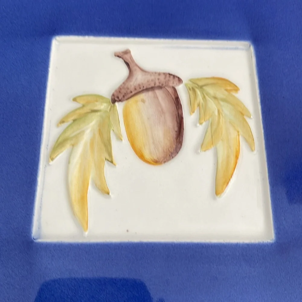 Crate & Barrel acorn trivet or wall hanging. Made in Italy by Ceramica Stefani.